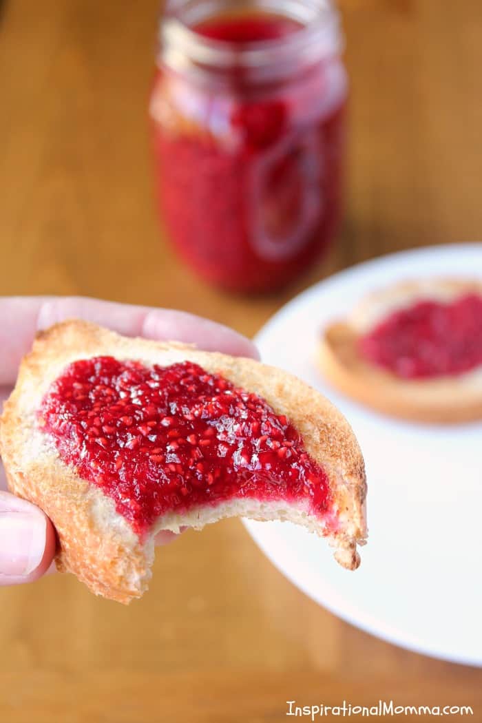 This Old-Fashioned Raspberry Freezer Jam will become a staple in your household! Sweet, delicious, and simple to make...even you can do it! 