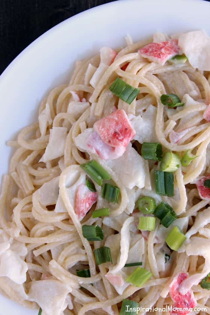 This Crab Alfredo Pasta is easy to make and even easier to enjoy! Sweet crab smothered in a creamy sauce served over a bed of pasta...absolutely delicious!
