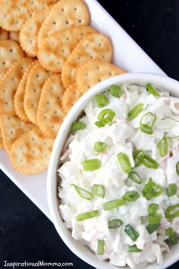 This Warm Crab & Cream Cheese Dip is a creamy appetizer, packed with crab meat and ready to be eaten! You will find your entire crowd surrounding it!!