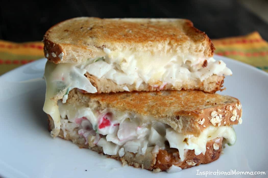 This Creamy Crab Grilled Cheese is simple and filled with flavors that will satisfy you! Creamy crab sandwiched between crispy, golden brown bread. Yum!