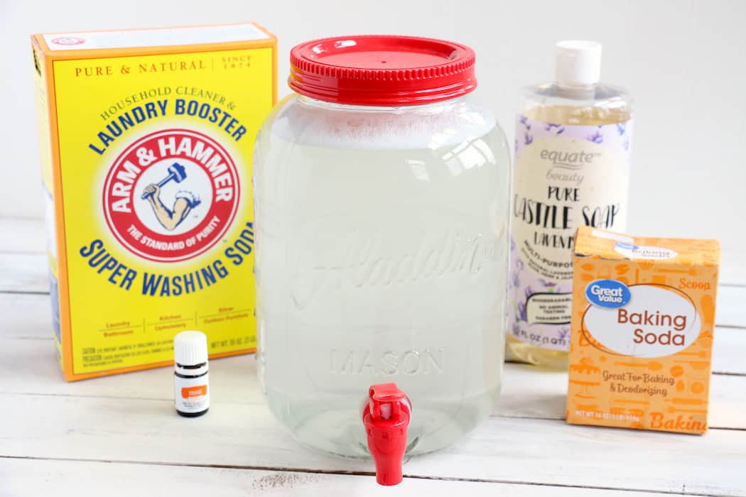 This Homemade Liquid Laundry Detergent will leave your clothes clean and smelling fresh while saving you money. Made with just 5 ingredients, it is so easy! #inspirationalmomma #homemadeliquidlaundrydetergent #laundrydetergent #homemade #diy #cleaning #cleaner #laundry #momonabudget