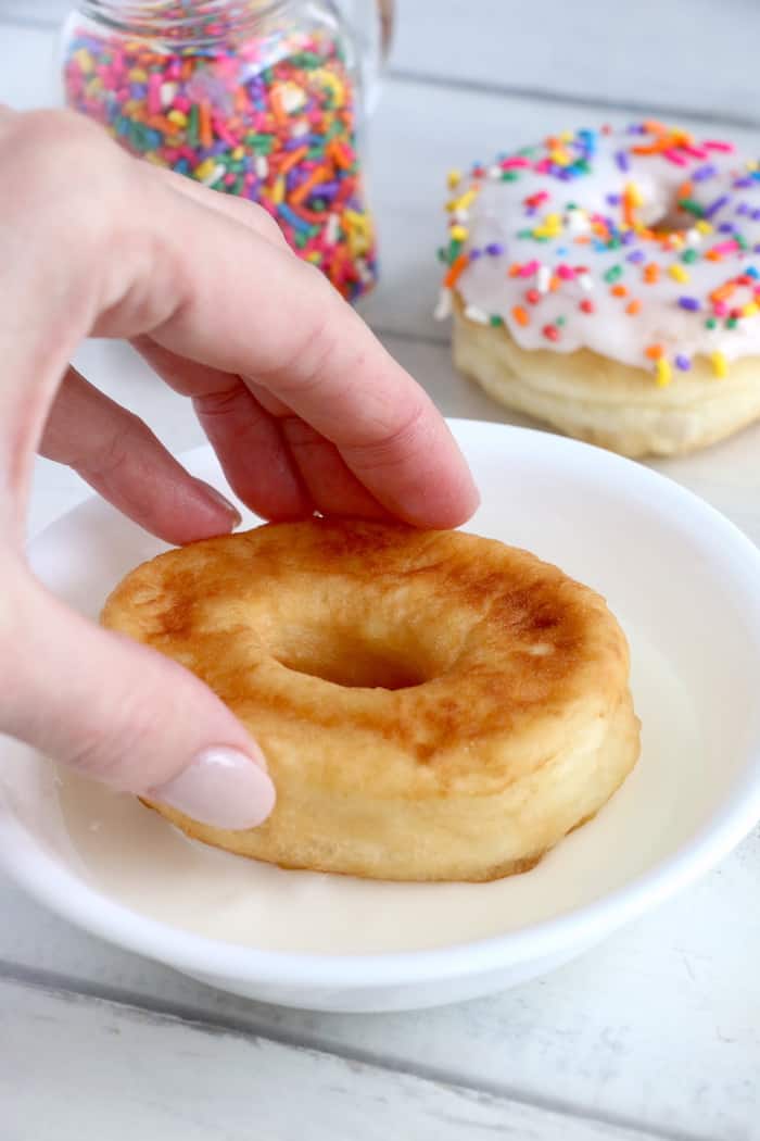 This Homemade Potato Donut Recipe makes soft, fluffy delicious donuts. Glazed with sweet icing, they are irresistible and absolutely addictive! #inspirationalmomma #homemadepotatodonutrecipe #donutrecipe #homemadedonuts #doughnuts #icing #homemadedoughnuts #homemade #deepfried