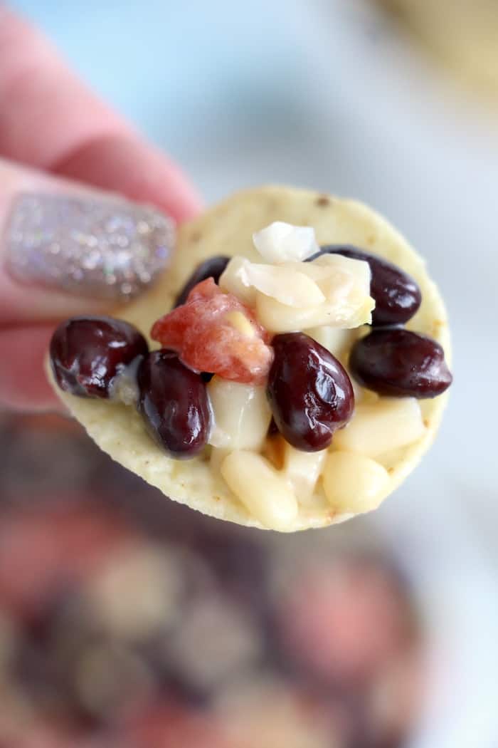 This quick, easy Texas Caviar appetizer is a flavorful bean dip with so many textures that it is sure to please everyone! #inspirationalmomma #cowboycaviar #appetizer #partyfood