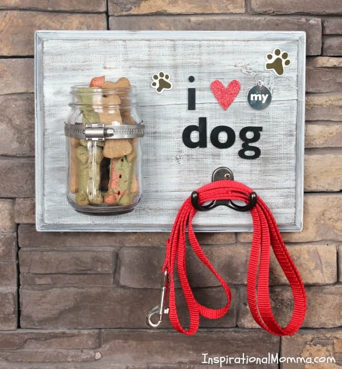 This DIY Dog Treat & Leash Station conveniently stores treats and a leash while adding a personal touch to a dog-lover's decor!