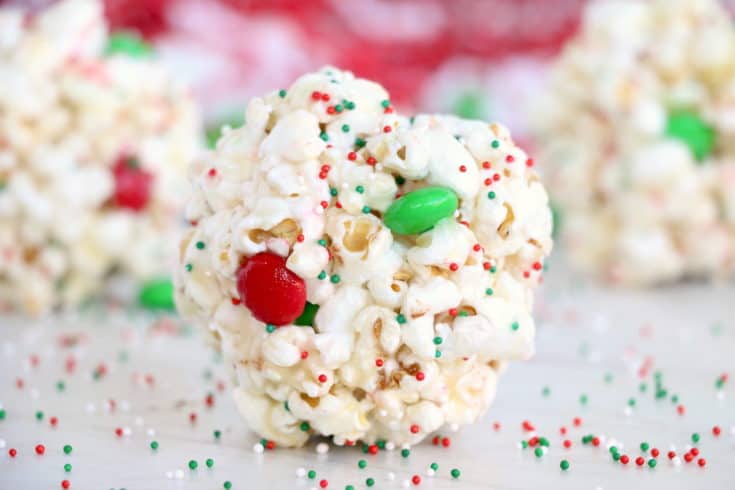 Easy Popcorn Balls are a perfect sweet, delicious treat for any occassion. This old-fashioned recipe is sure to put a smile on everyone's face! #inspirationalmomma #easypopcornballs #popcornballsrecipe #recipe #dessert #sweet #easy #Christmas #holidays