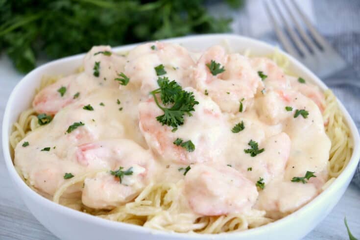 Creamy Shrimp Pasta served in a white bowl.