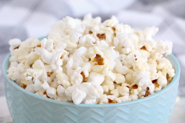 Instant Pot Popcorn in a blue bowl.