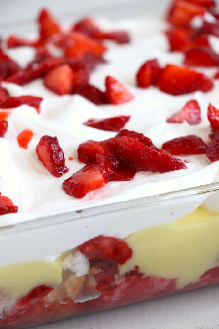 Strawberry Angel Food Dessert layered in a clear baking dish.