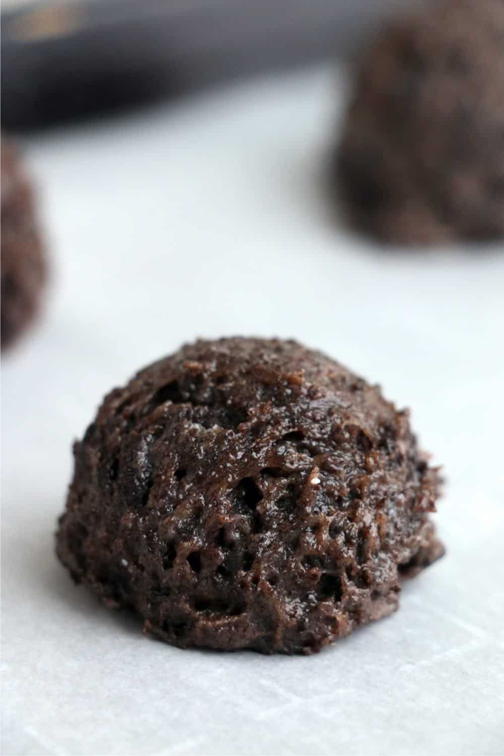 Truffle scooped and placed on a baking sheet.