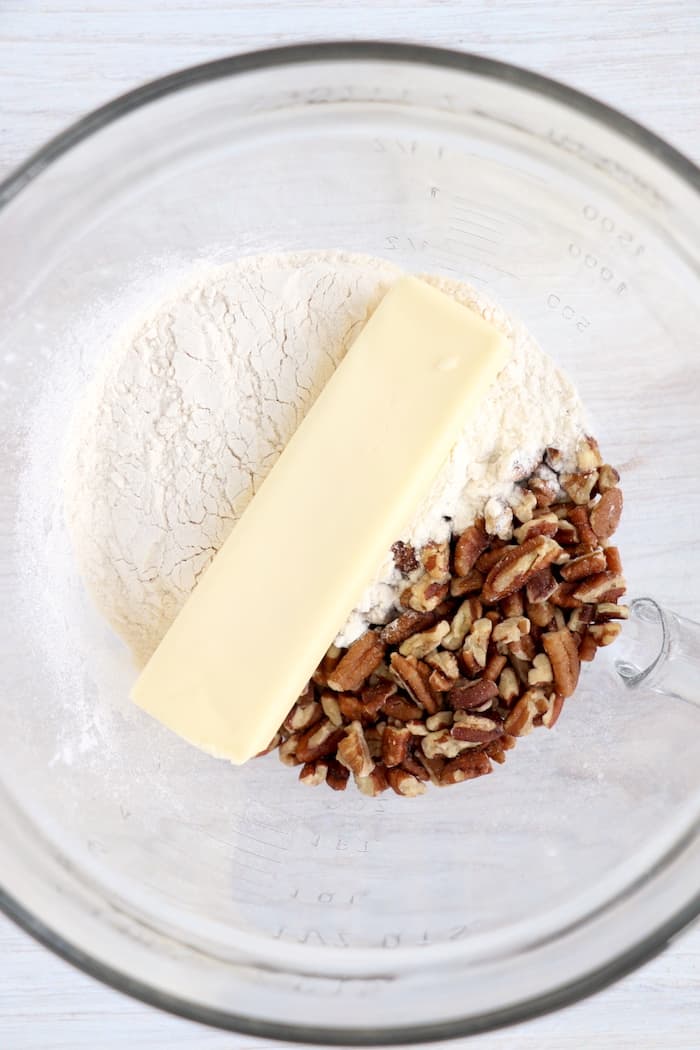 Ingredients for the crust layer in a glass bowl.