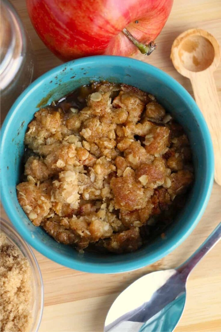 turquoise bowl of classic apple crumb dessert