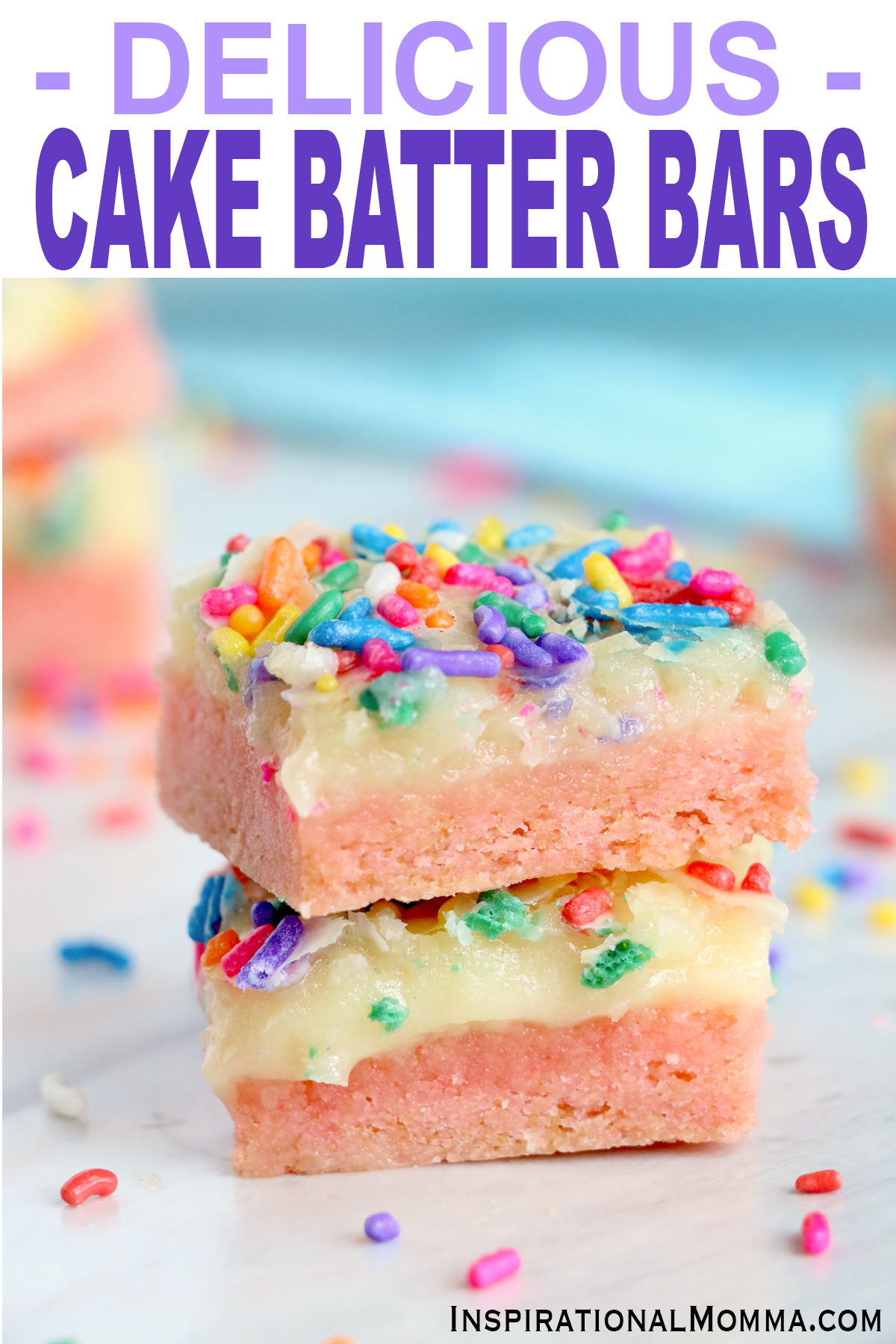 Closeup shot of cake batter bars stacked atop one another.