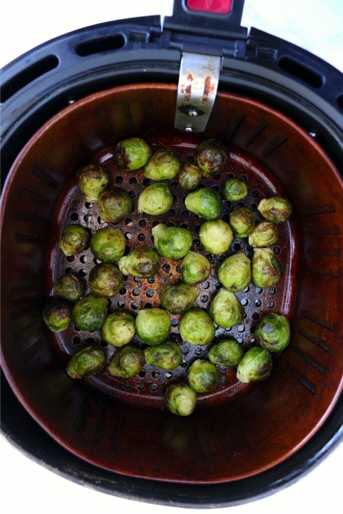 Overhead shot of cooked brussel sprouts in air fryer