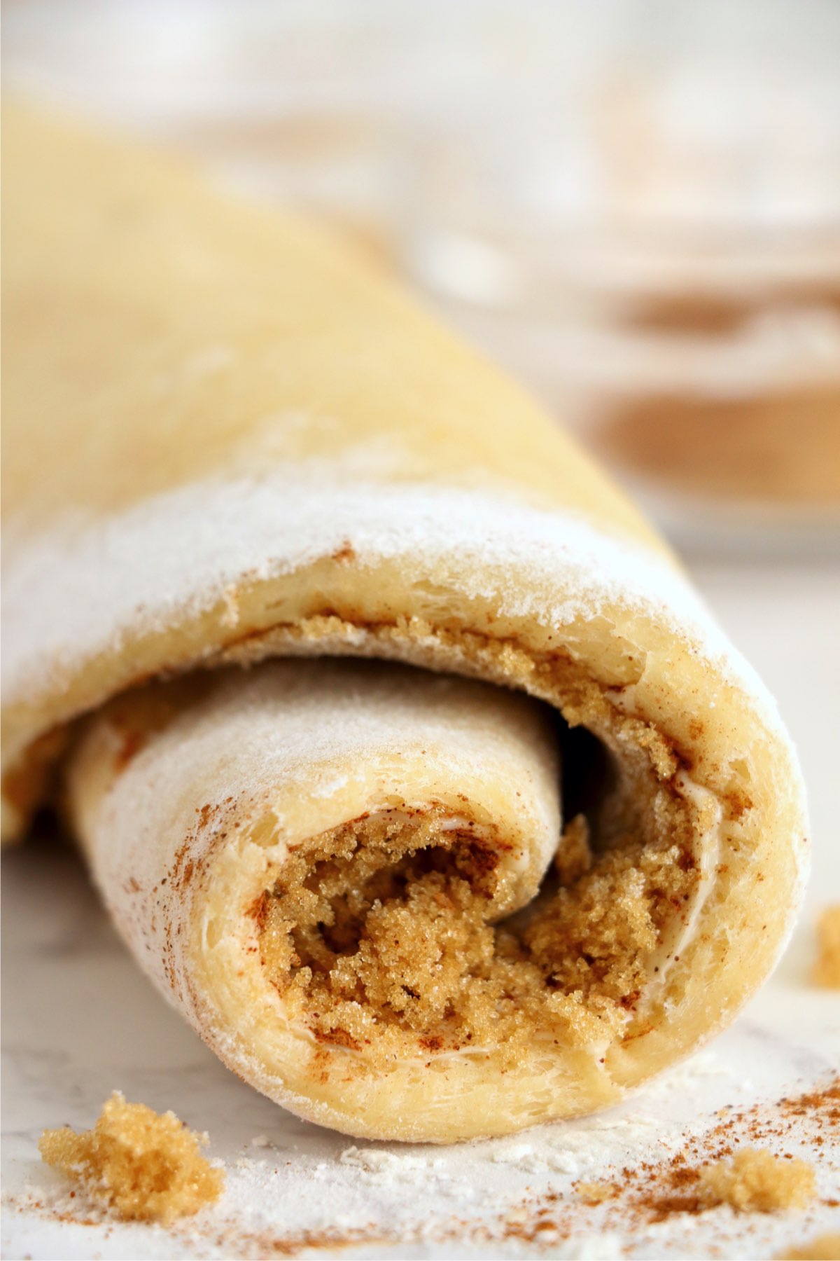 Closeup shot of dough rolled up into tube