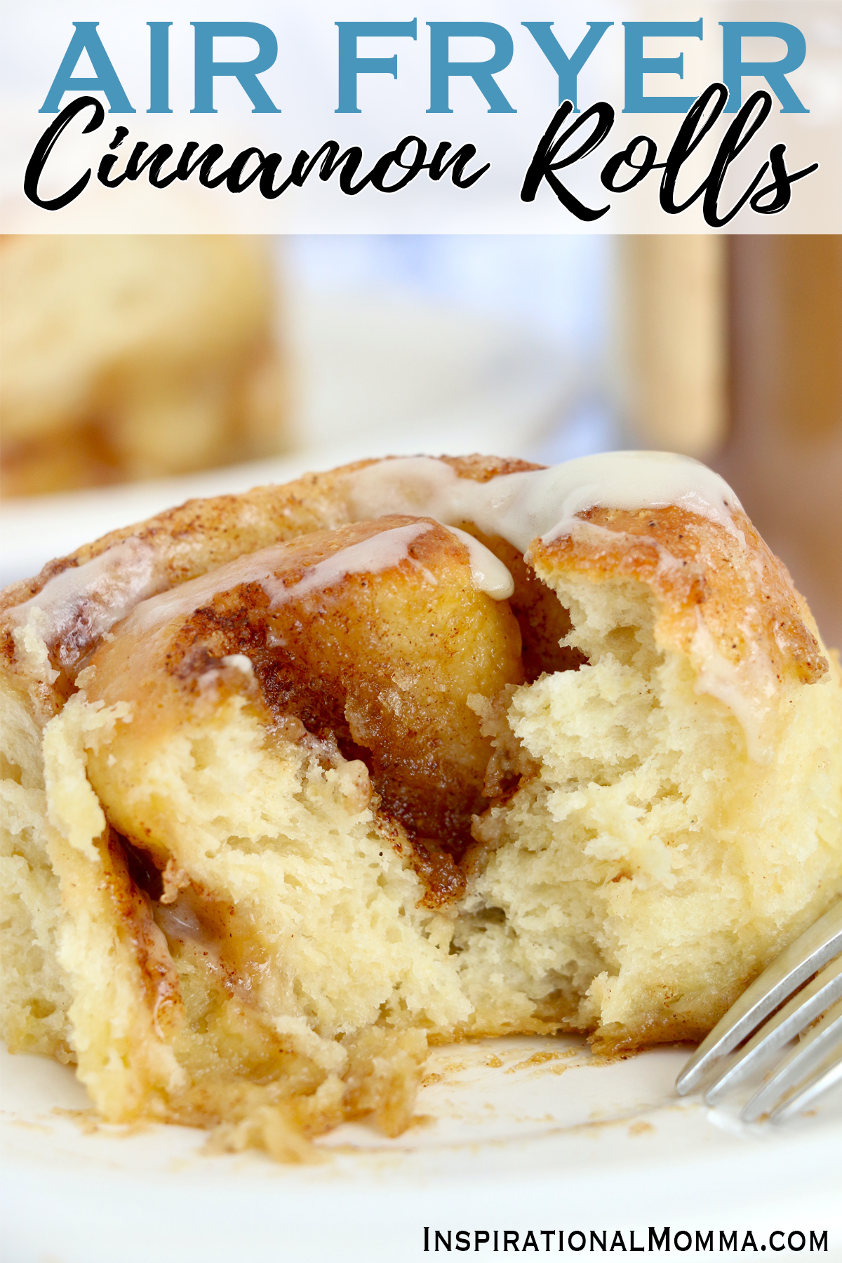Closeup shot of air fryer cinnamon roll with fork on plate 