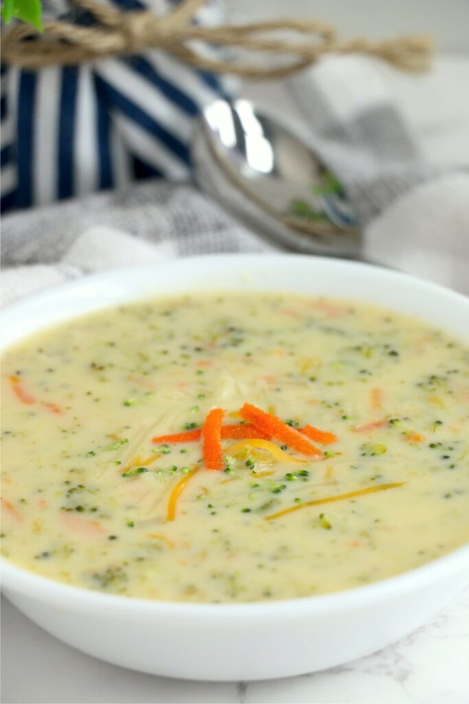 Closeup shot of bowlful of instant pot panera broccoli cheddar soup