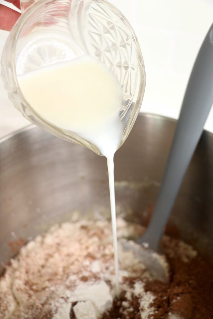 Milk being poured into batter