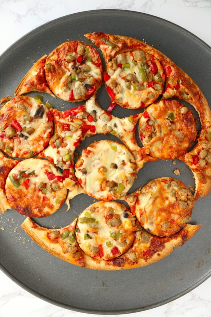 Overhead shot of frozen pizza cut into circles