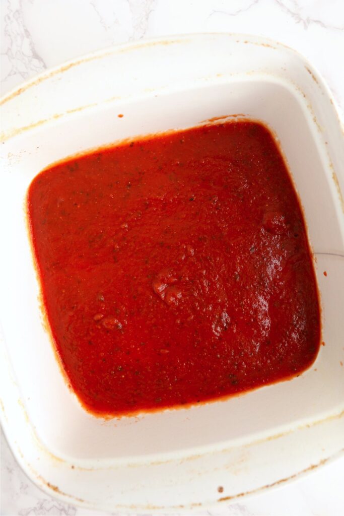 Overhead shot of sauce in baking dish.