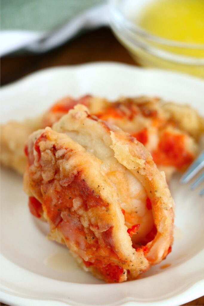 Closeup shot of fried lobster tails on plate