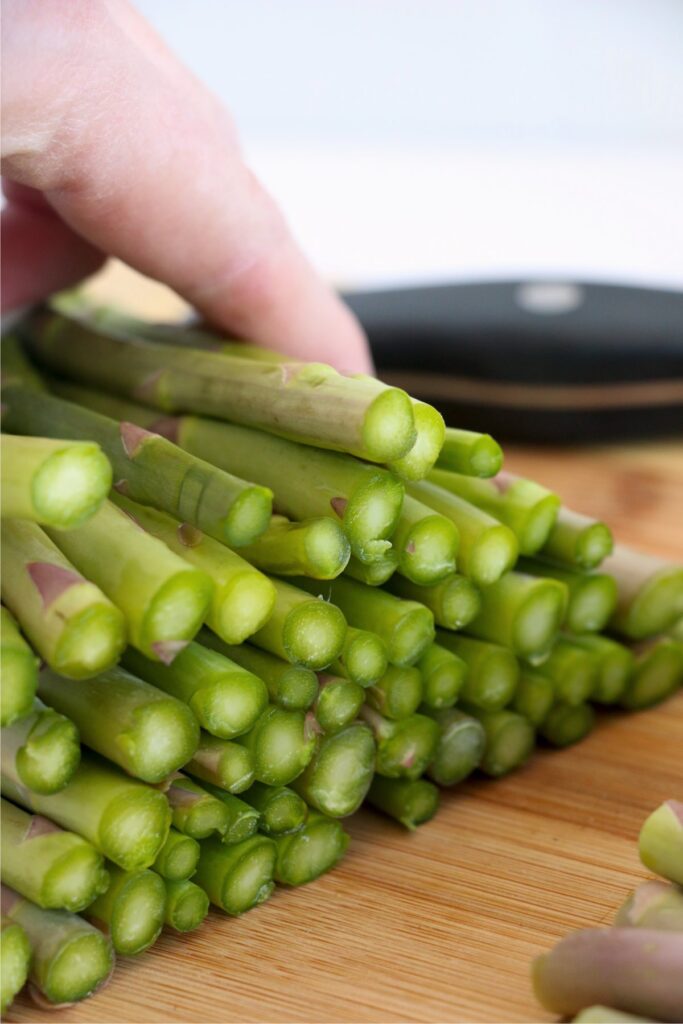 Closeup shot of pile of trimmed asparagus