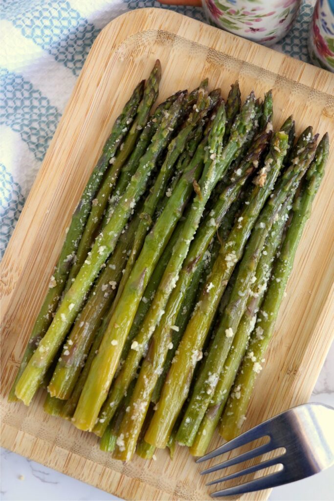 Overhead shot of instant pot asparagus on cutting board