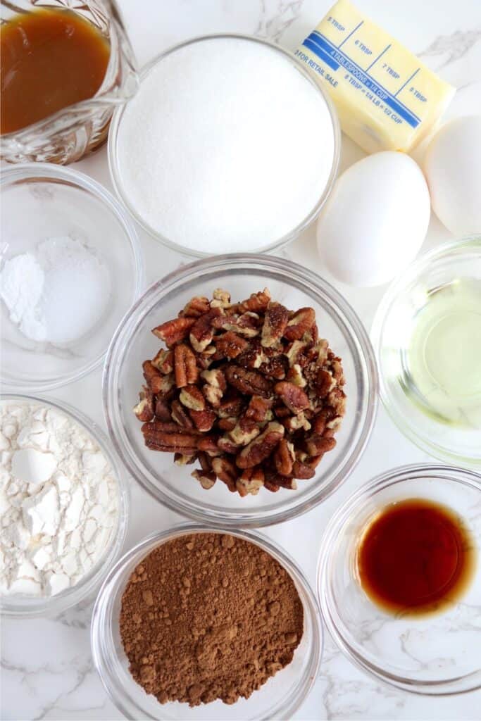 Overhead shot of brownie ingredients in individual bowls