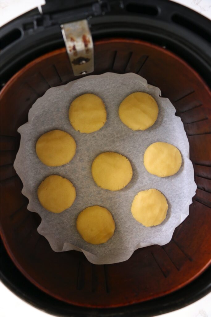 Overhead shot of raw sugar cookies in air fryer