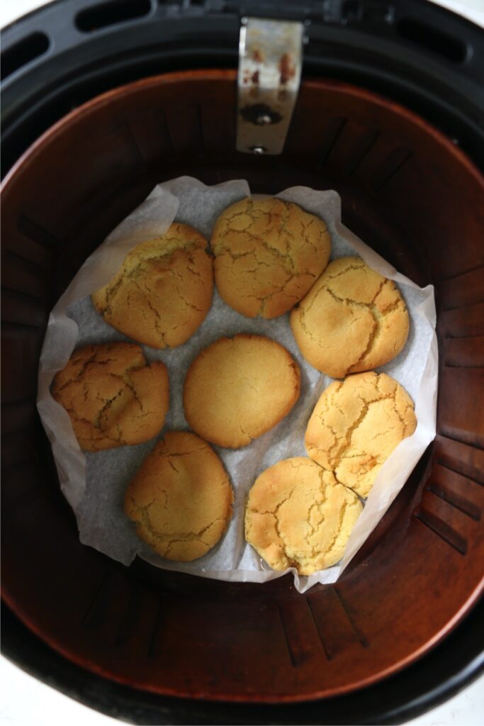 Overhead shot of cooked sugar cookies in air fryer