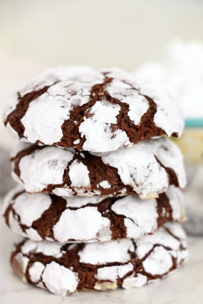 Closeup shot of chocolate crack cookies stacked atop one another