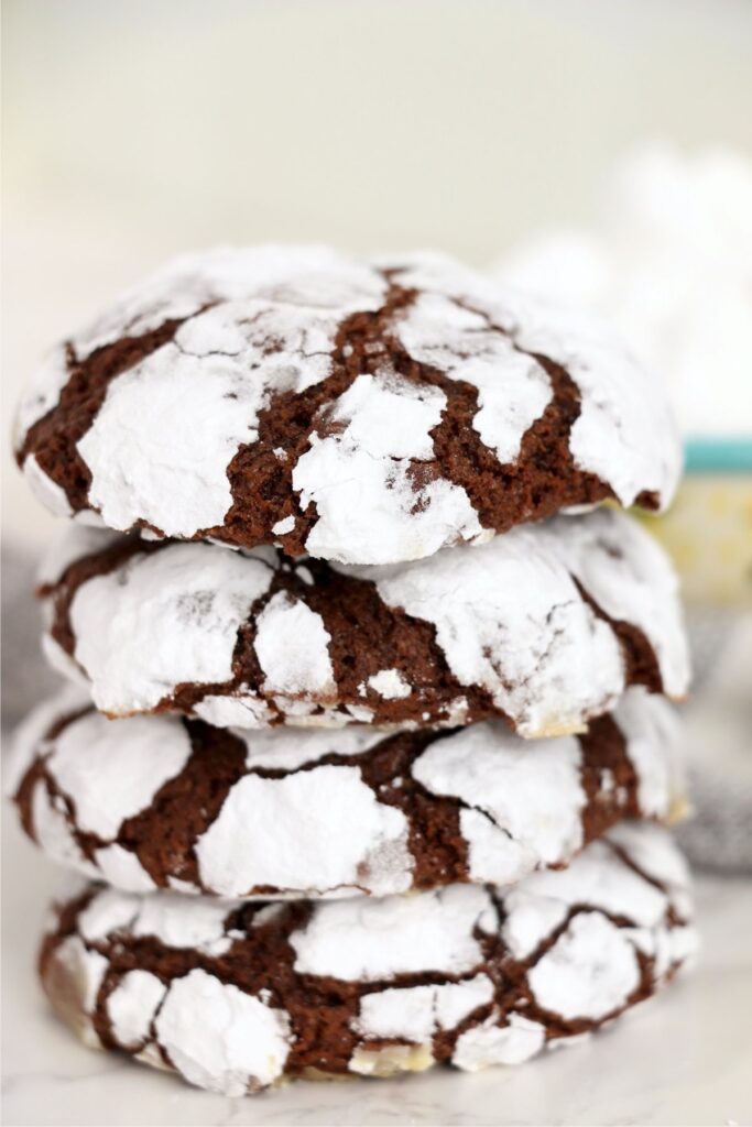 Closeup shot of chocolate crack cookies stacked atop one another