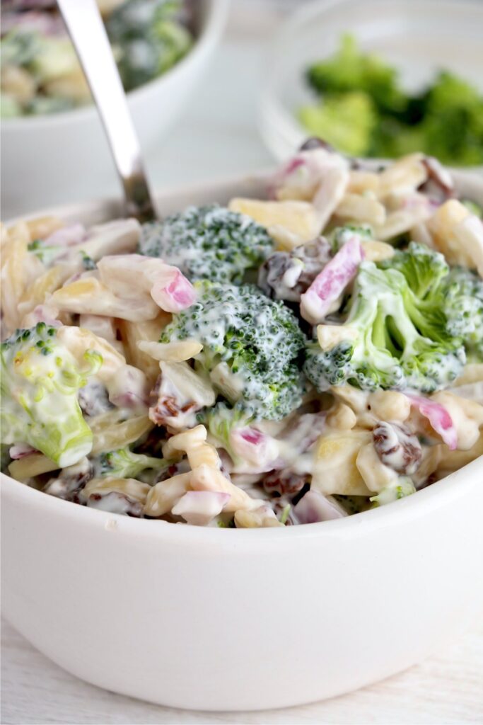Closeup shot of creamy broccoli salad in bowl