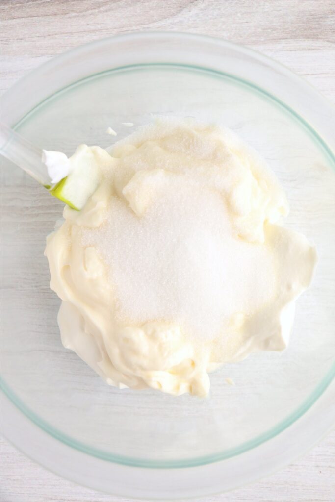 Overhead shot of mayo, sour cream, and sugar in bowl