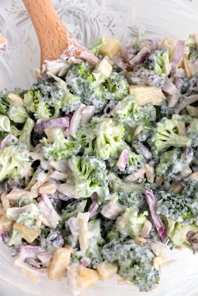 Closeup shot of creamy broccoli salad recipe in bowl