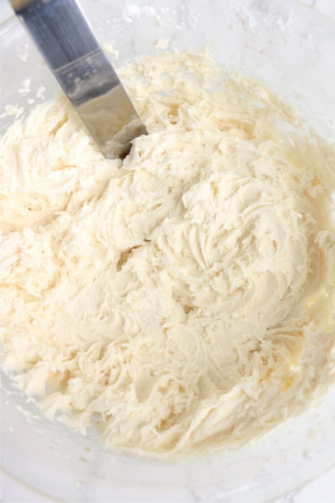 Overhead shot of buttercream frosting in bowl