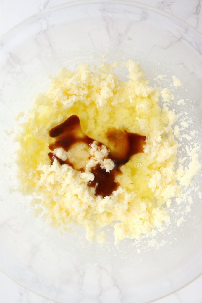 Overhead shot of wet cake ingredients in bowl