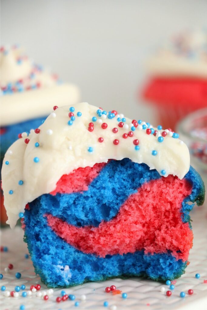 Closeup shot of red white and blue cupcake cut in half