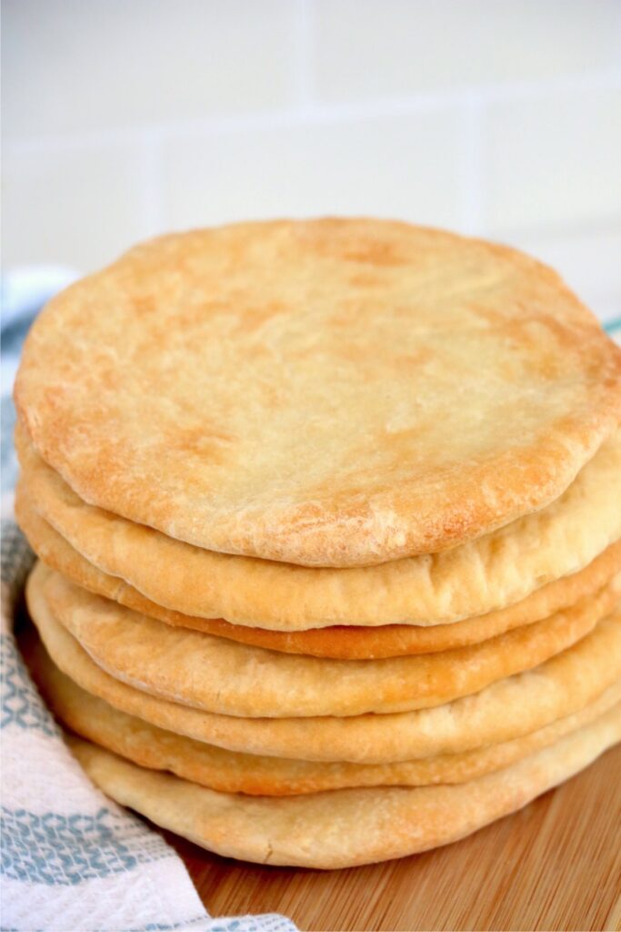 Stack of air fryer flatbread on cutting board