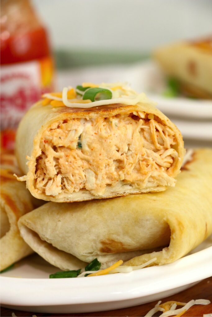 Closeup shot of Buffalo chicken wraps on plate