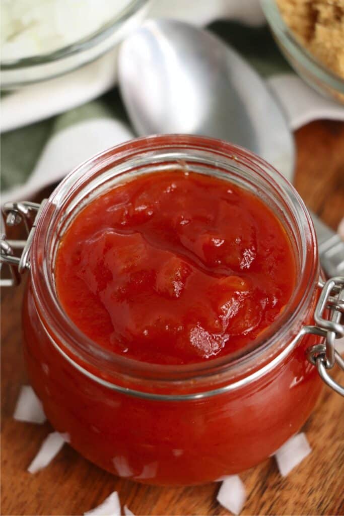 Closeup shot of onion ketchup in glass jar