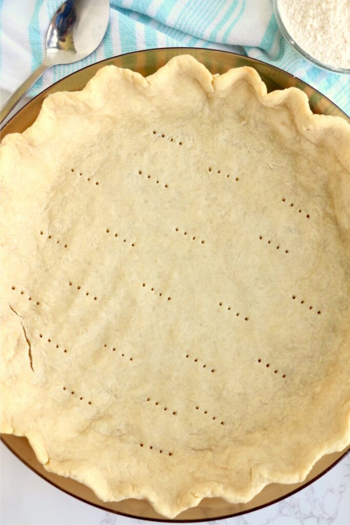 Overhead shot of 3-ingredient pie crust in pie plate