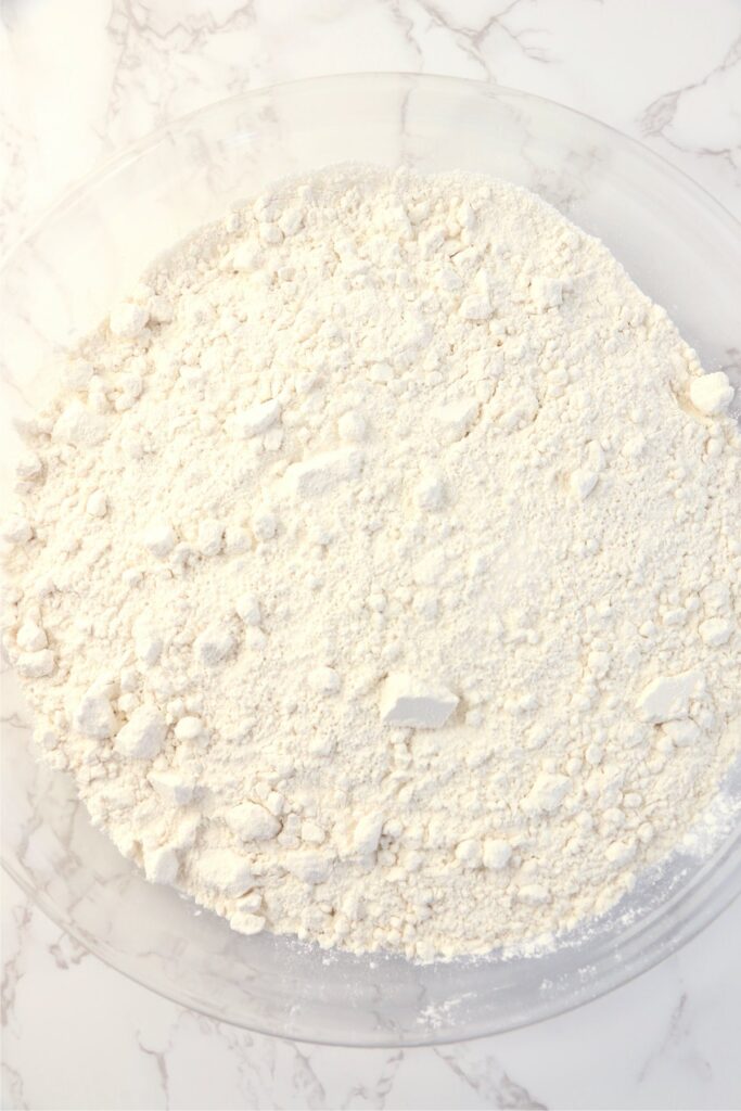 Overhead shot of flour and salt in bowl