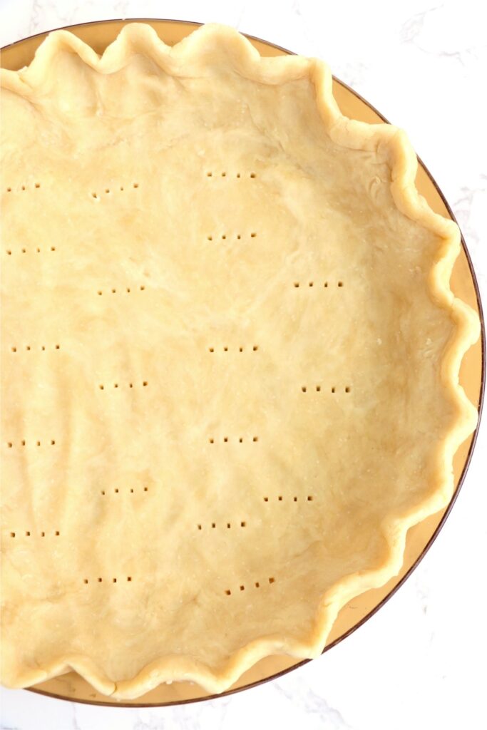 Overhead shot of 3-ingredient pie crust in pie plate