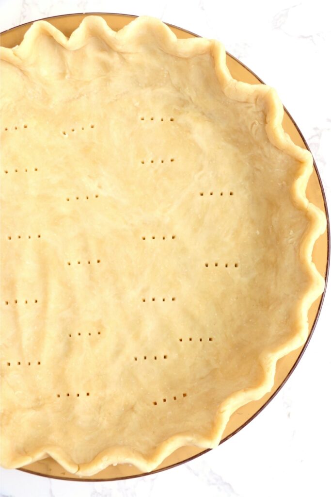 Overhead shot of 3-ingredient pie crust in pie plate