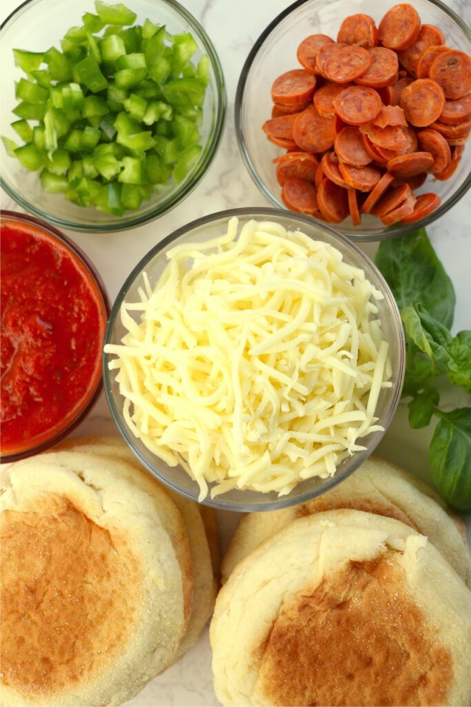 Overhead shot of English muffin ingredients on table