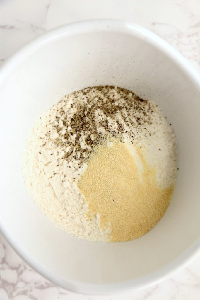 Overhead shot of flour and seasonings in bowl