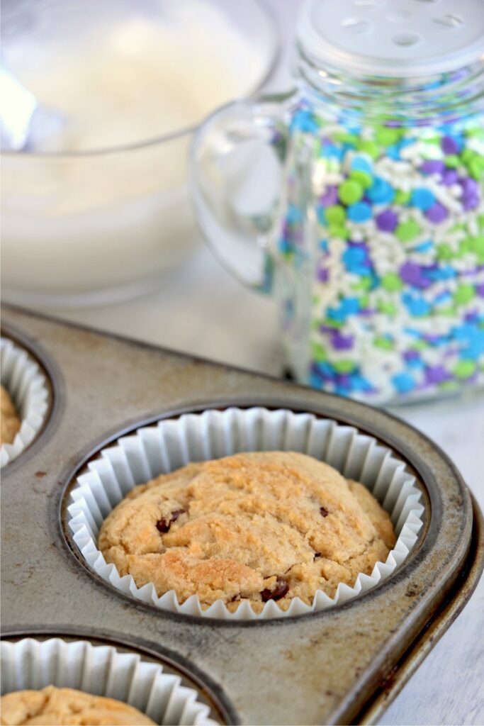 Closeup shot of chocolate chip cookies in muffin tin