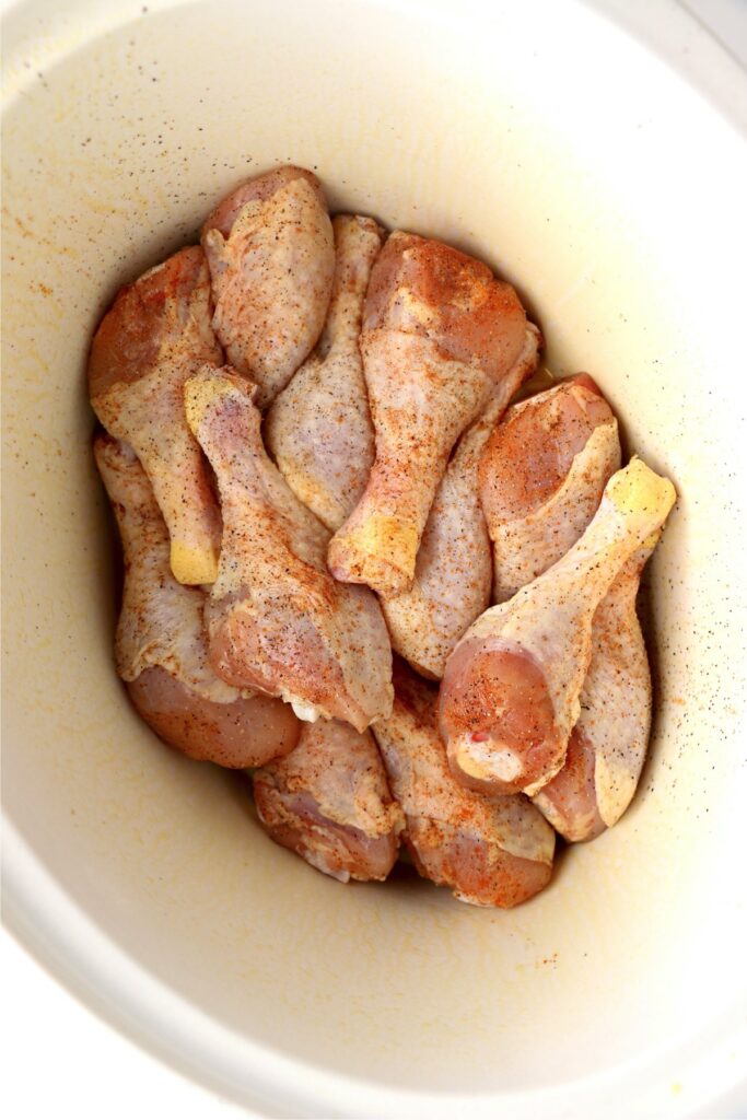 Overehead shot of drumsticks in crock pot