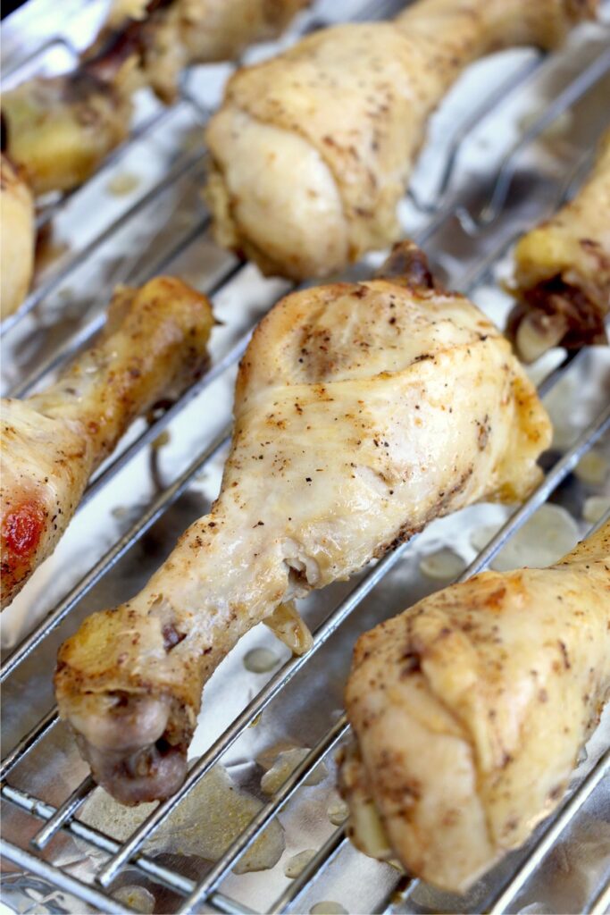 Closeup shot of chicken drumsticks on rack