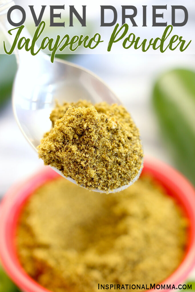 Closeup shot of spoonful of jalapeno powder over bowl of more jalapeno powder